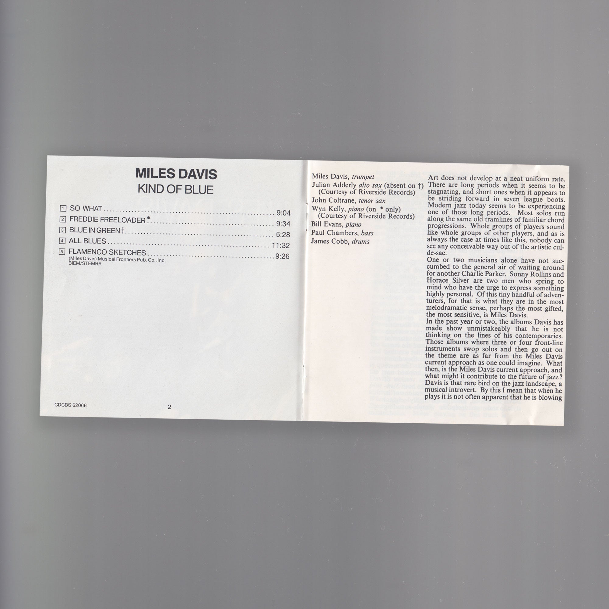 Scanned image of Miles Davis' Kind of Blue CD booklet. The pages display the track listing for the album and a press release written by Benny Green.