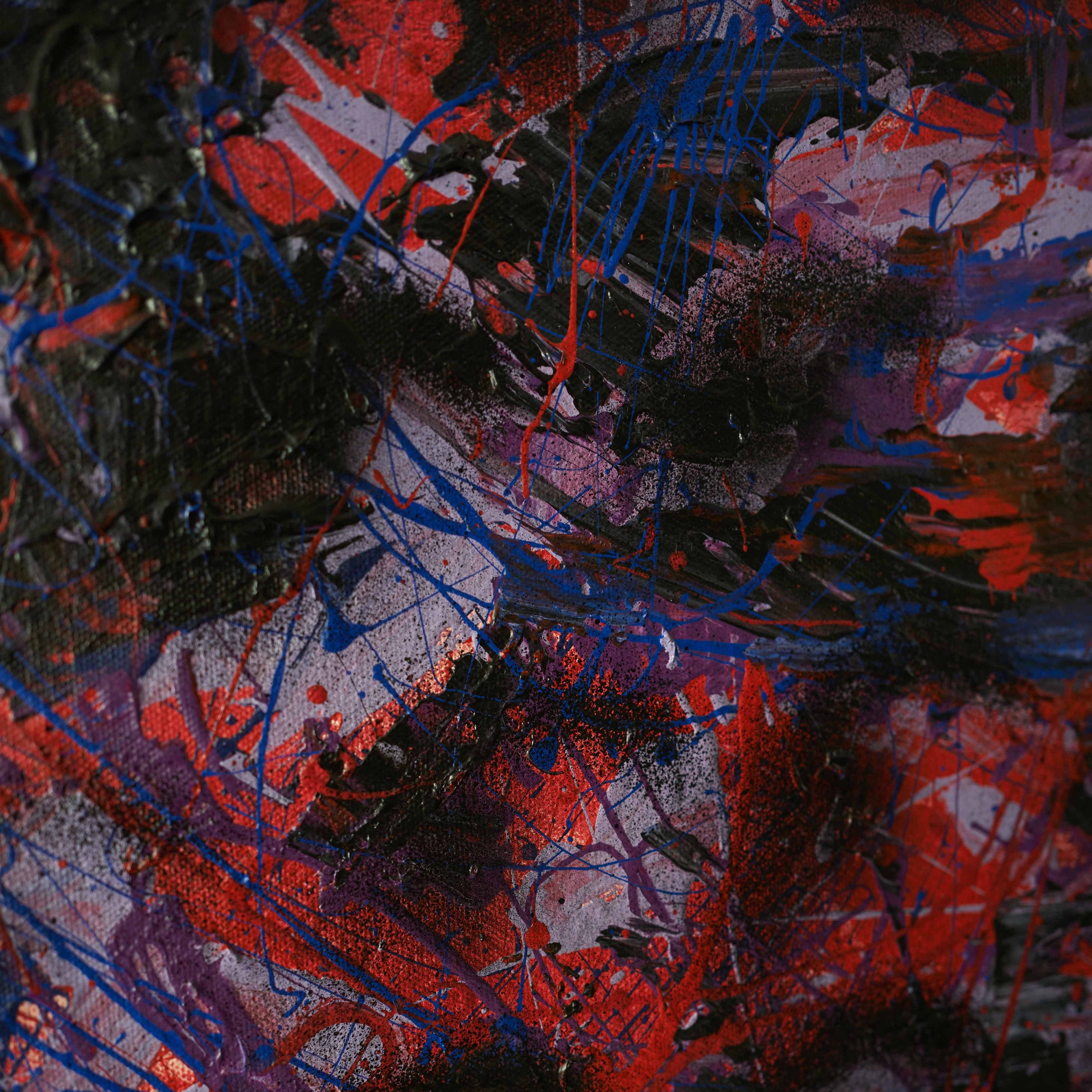 Detail shot of wa sei's 'Shadow Inhales': Close-up featuring black spray-painted dots, and splatters of blue and red acrylic paint.