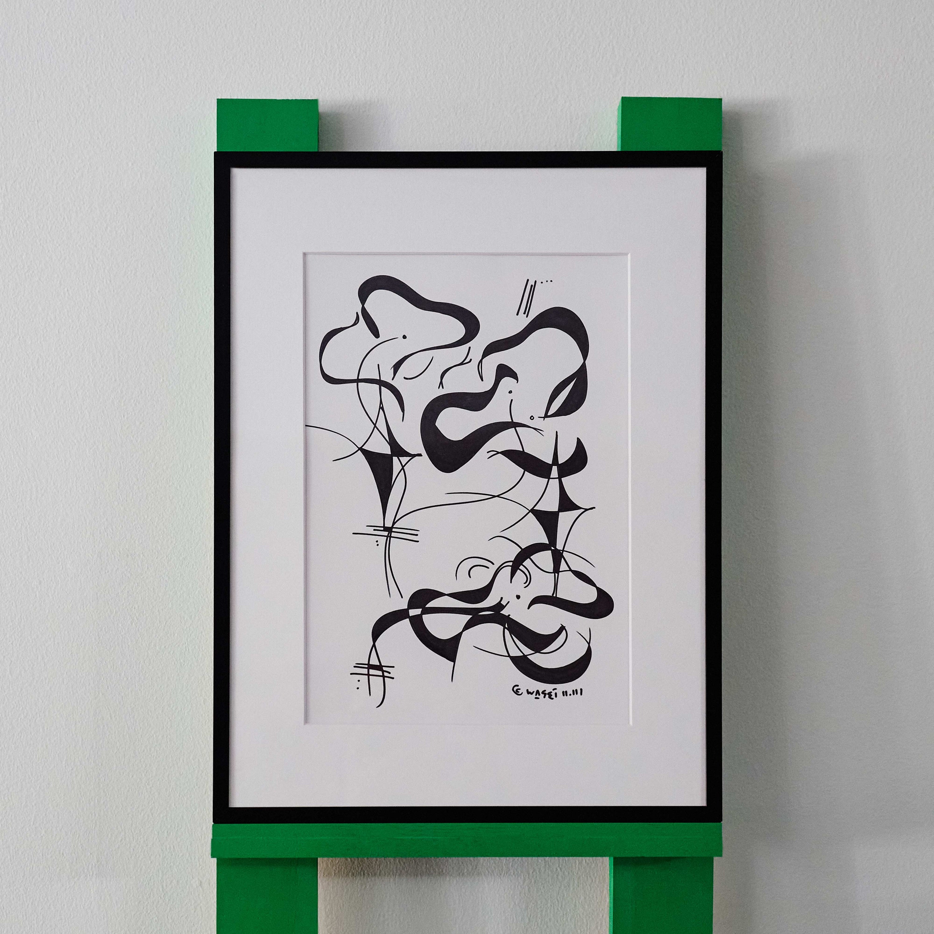 A black and white line drawing by wa sei. The artwork depicts an abstracted flower and shapes, displayed in a black frame.