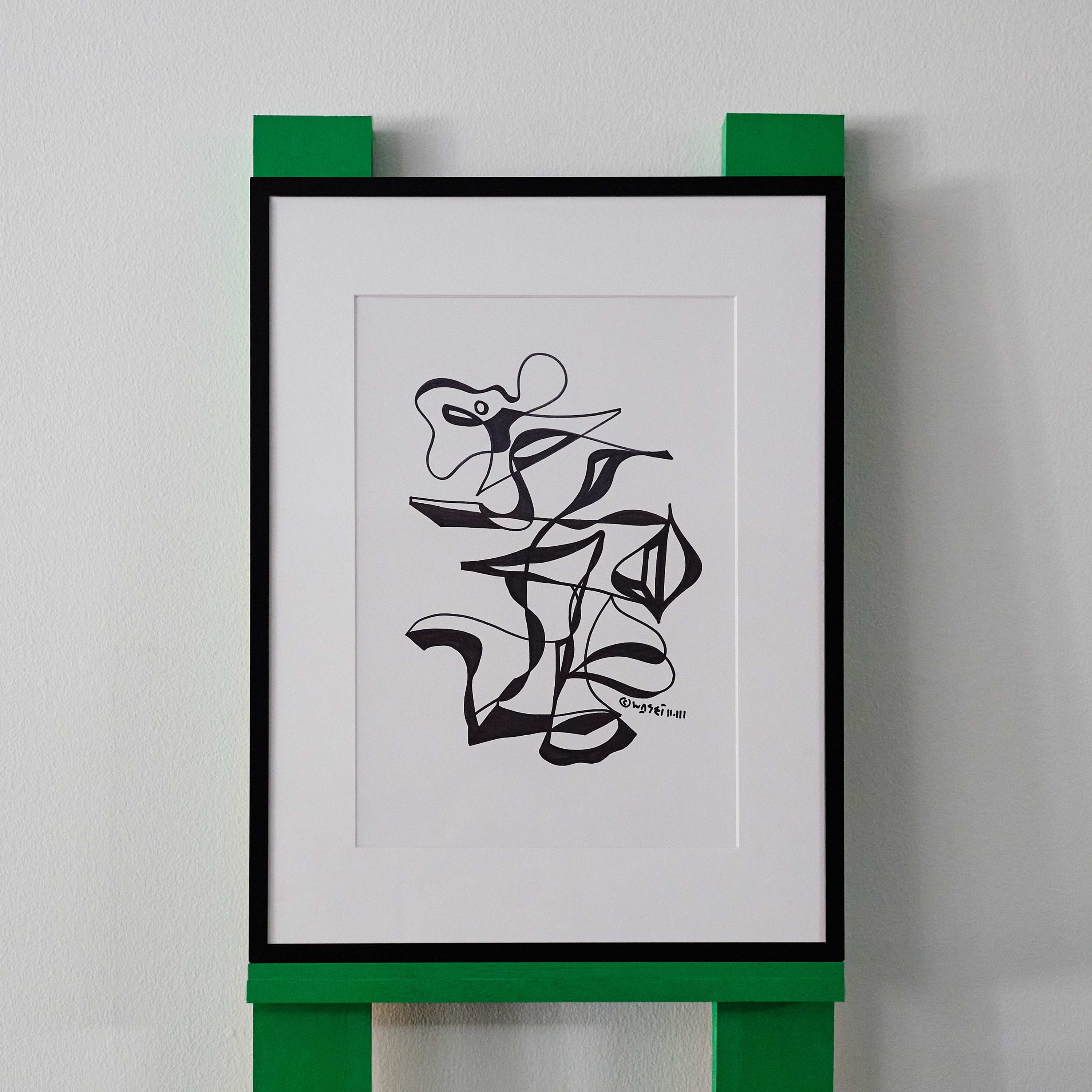 A black and white line drawing by wa sei. The artwork depicts an abstracted figure and shapes, displayed in a sleek black frame.