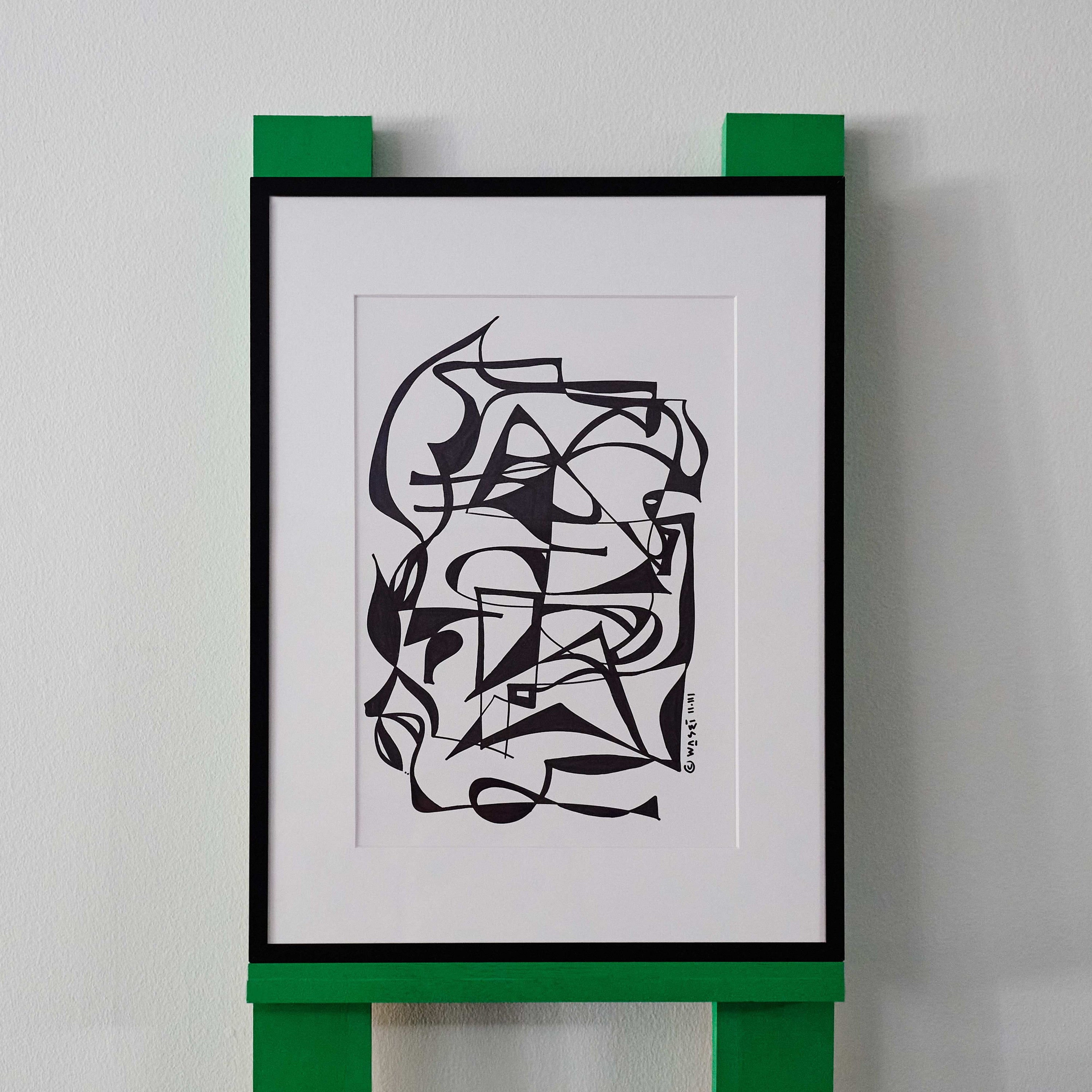 A black and white line drawing by wa sei. The artwork depicts an abstracted figure,  displayed in a sleek black frame.